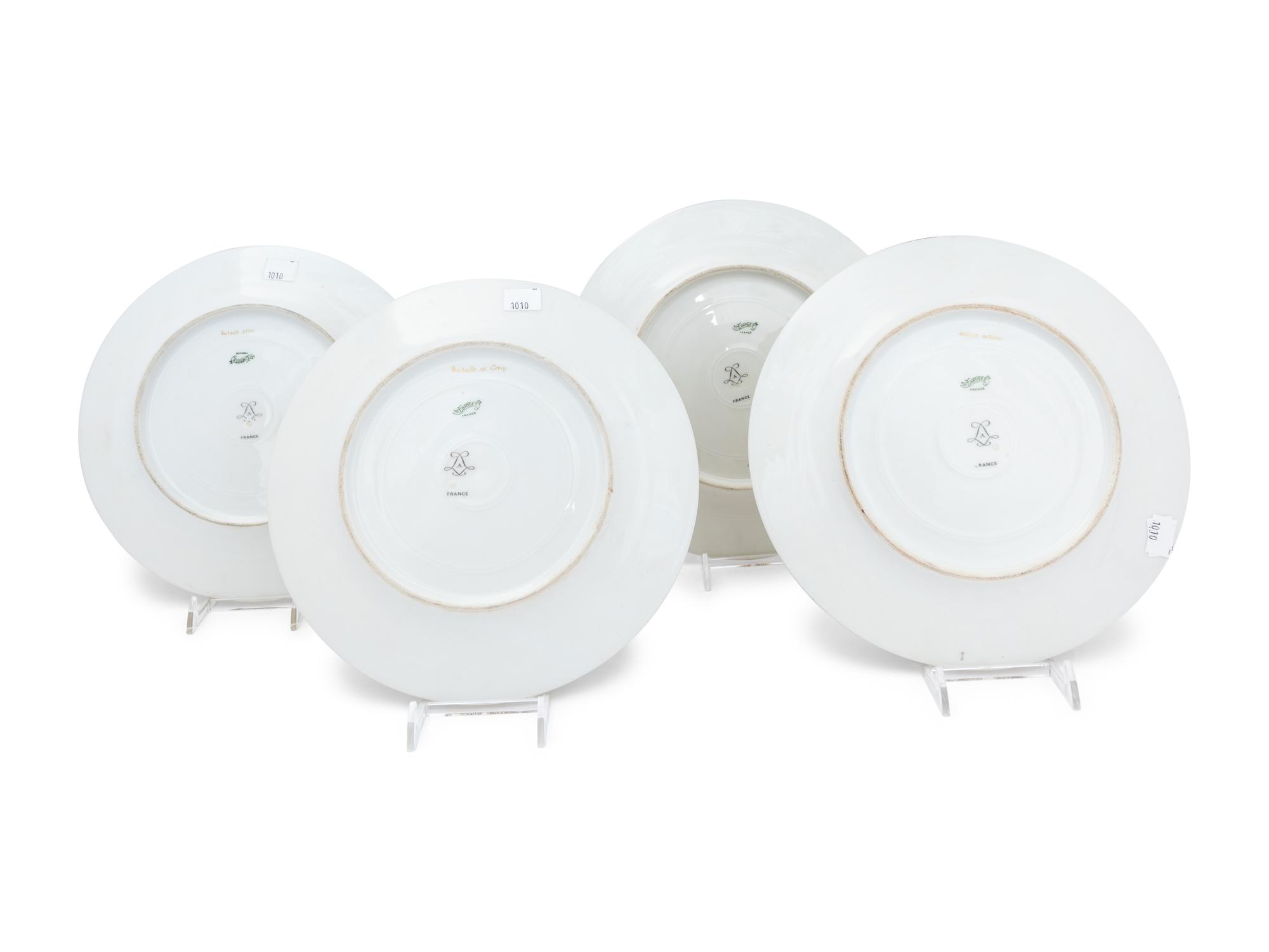 A Set of Four Limoges Porcelain Cabinet Plates