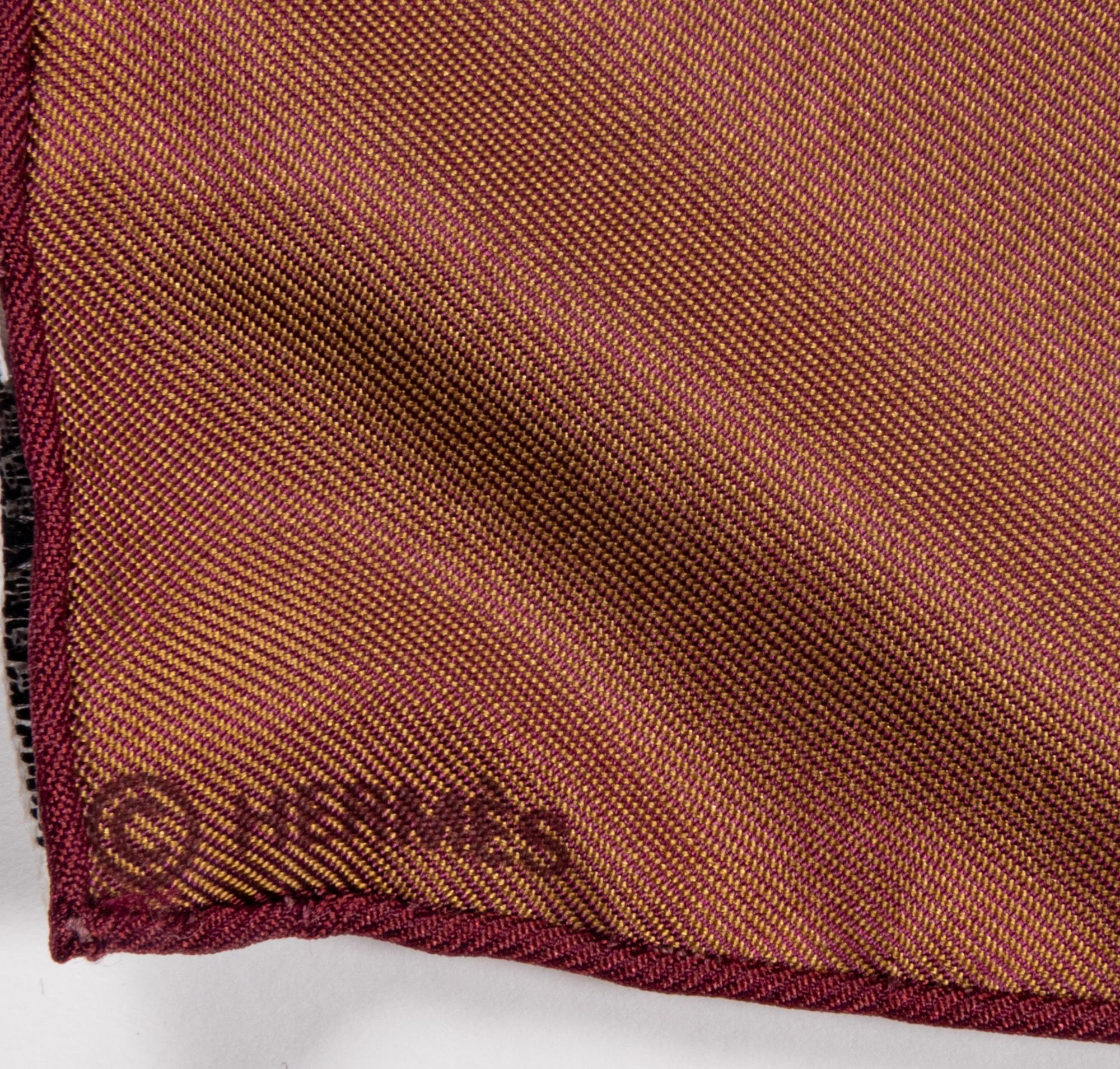 Seven Designer Scarves: Two Gucci, One Jean Paul Gaultier, Two Must de Cartier, One Hermès, One Christian Dior