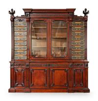 A French Parcel Ebonized Walnut Cartonnier Bibliotheque