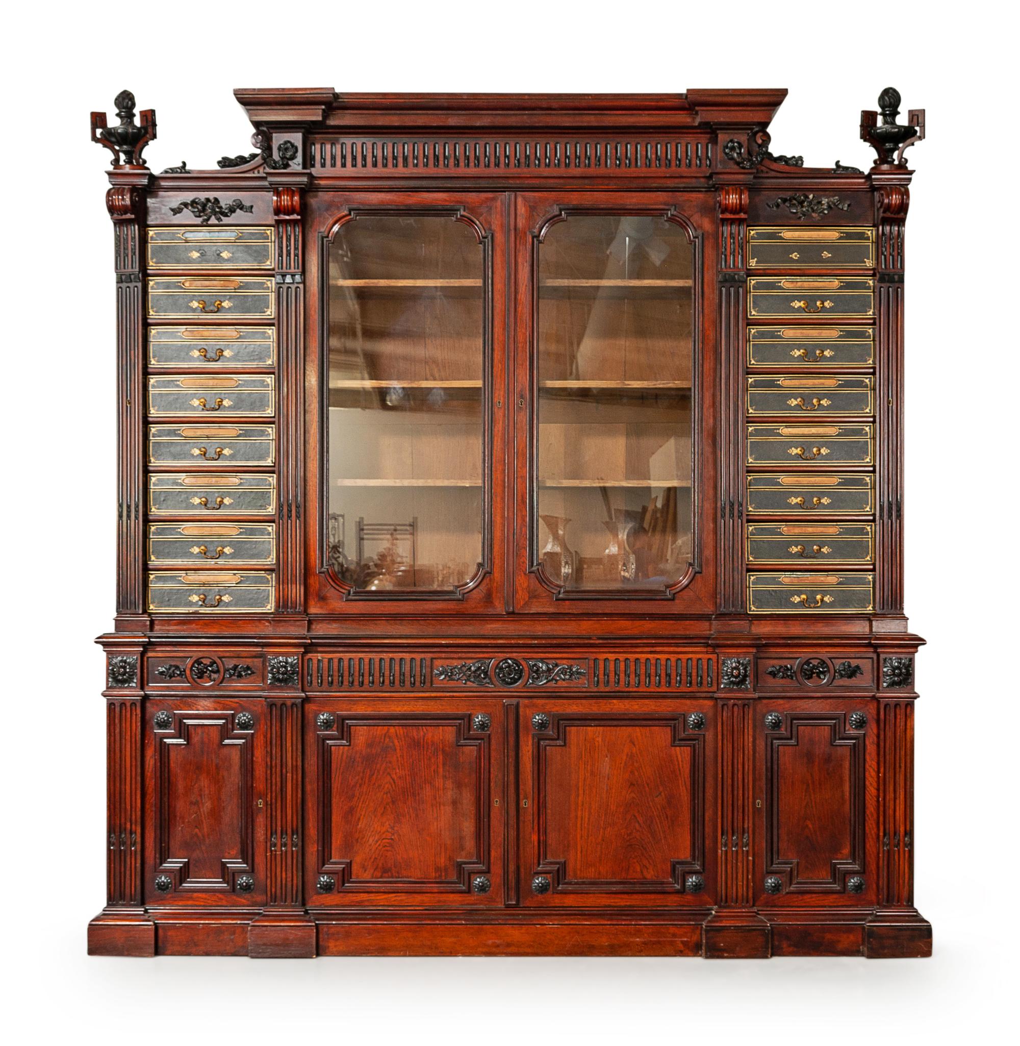 A French Parcel Ebonized Walnut Cartonnier Bibliotheque