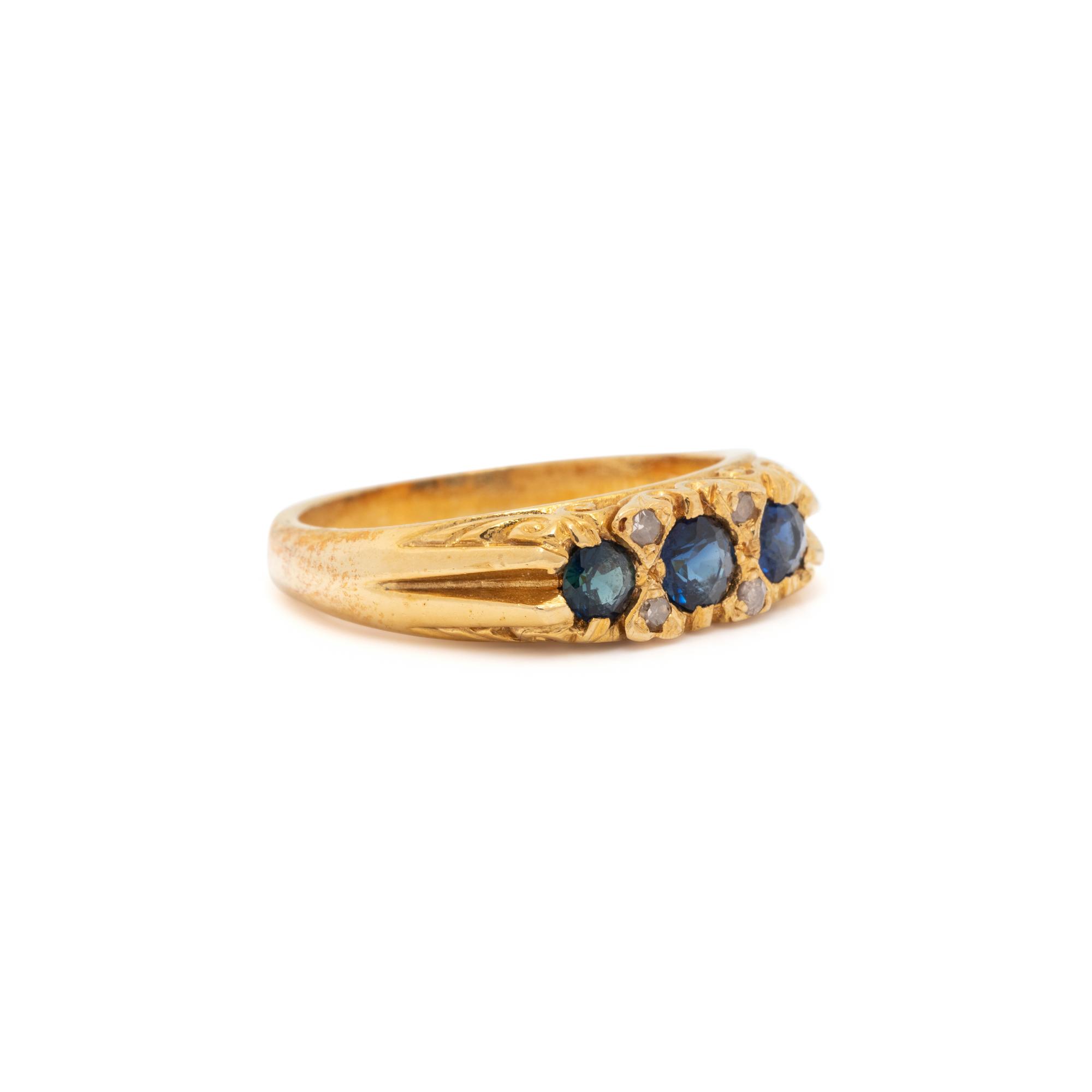 YELLOW GOLD, SYNTHETIC SAPPHIRE AND DIAMOND RING
