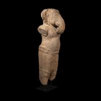A Khmer Grey Sandstone Figure of Ganesha, Angkor Period, 10th-11th Century 十-十一世紀 吳哥窟灰沙岩象鼻天立像