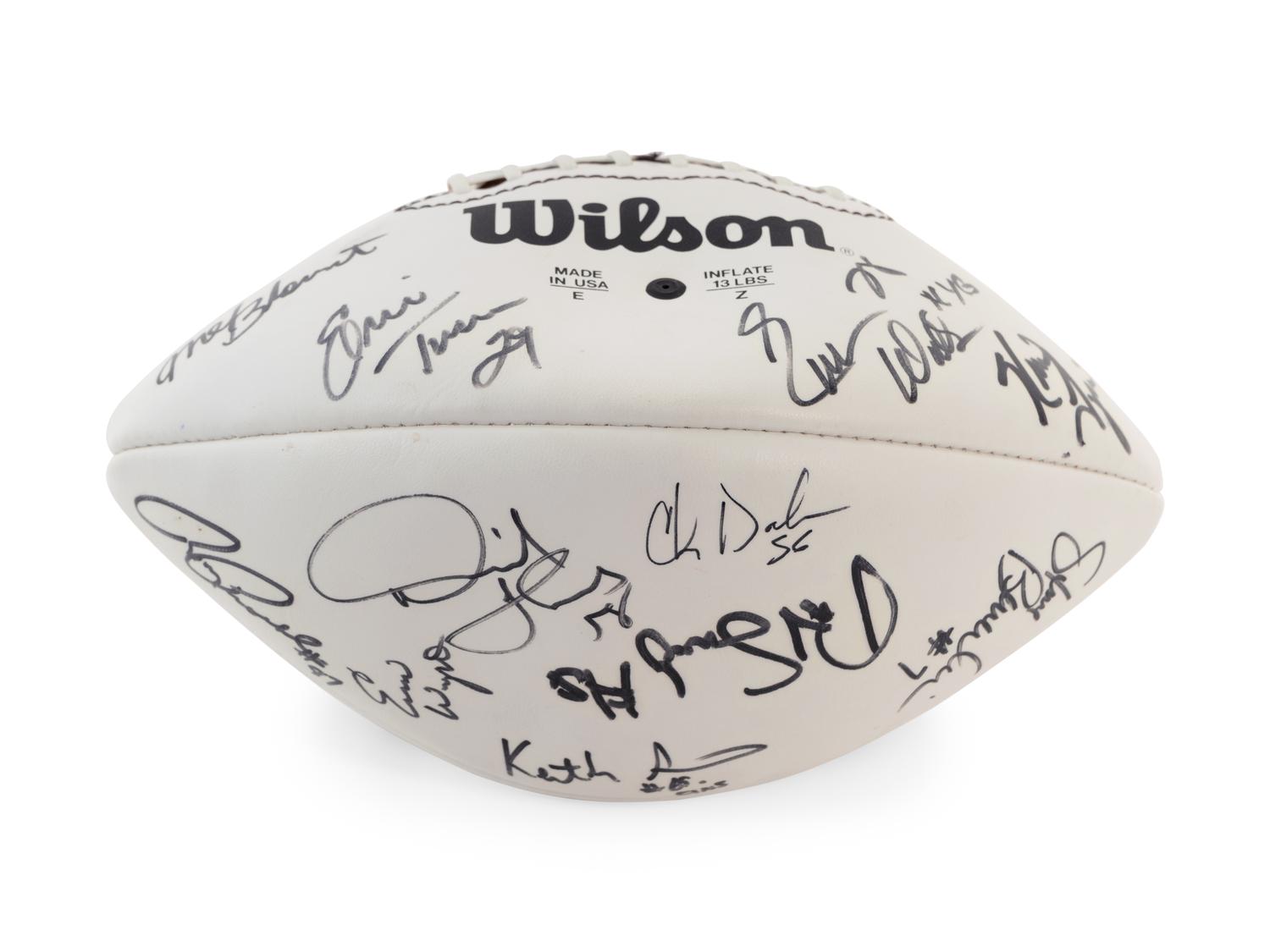 A Group of Three Signed Football Items Including Derrick Thomas and Lawrence Taylor