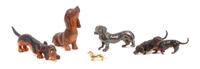 A Group of Four Dachshund Figures Height of tallest 3 1/2 inches.