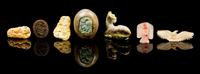 Seven Carved Hardstone Toggles Height of largest 1 3/4 x width 2 1/4 x depth 3 1/4 inches.