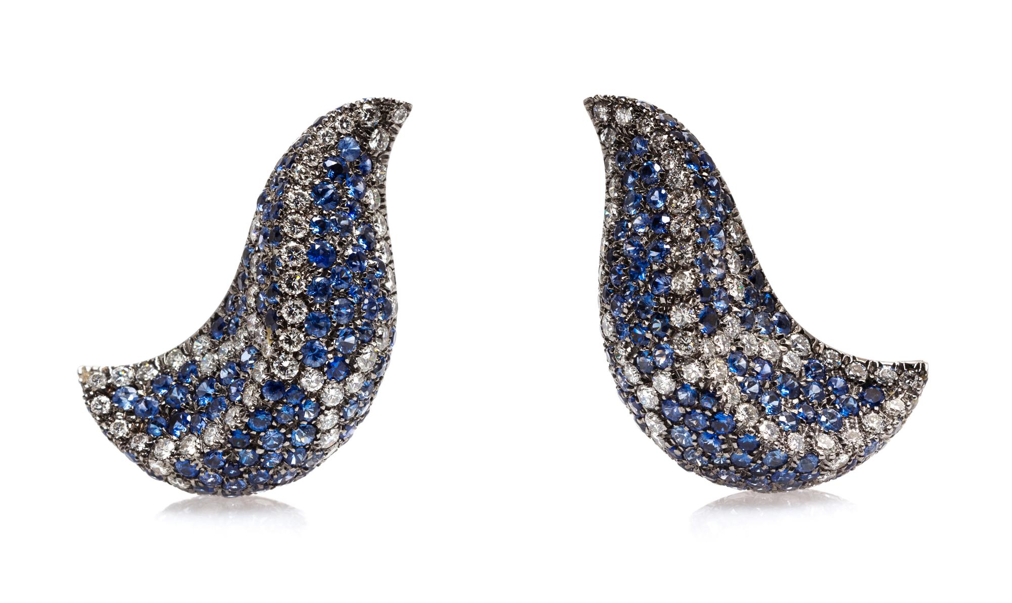 A Pair of 18 Karat White Gold, Sapphire and Diamond Earclips, 20.60 dwts.