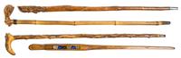 A Collection of Three Carved Wood Canes, Height of tallest overall 37 inches.