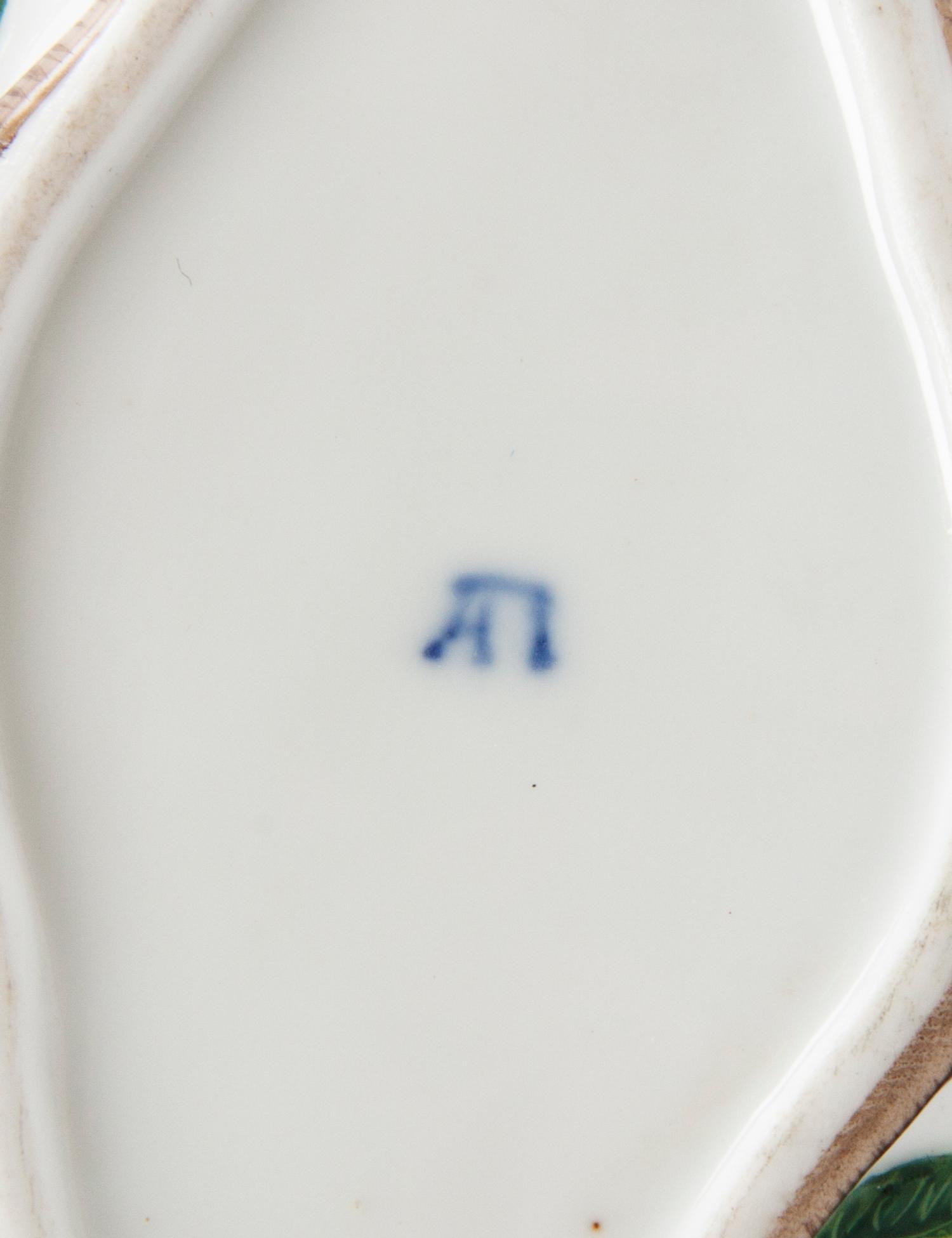 A Russian Porcelain Creamer and Sugar Set, Popov, Width of widest over handles 5 1/4 inches.