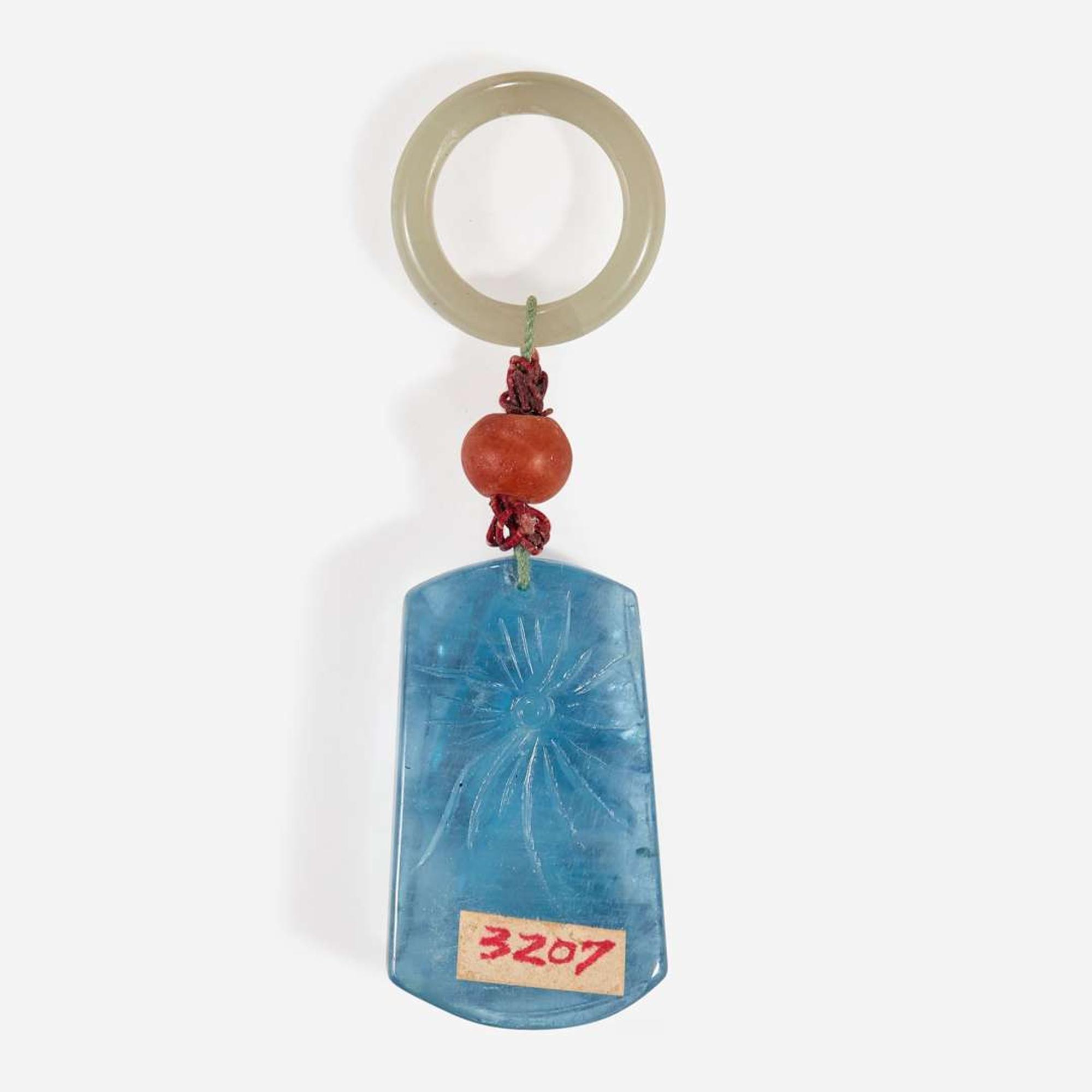 A Chinese carved aquamarine pendant