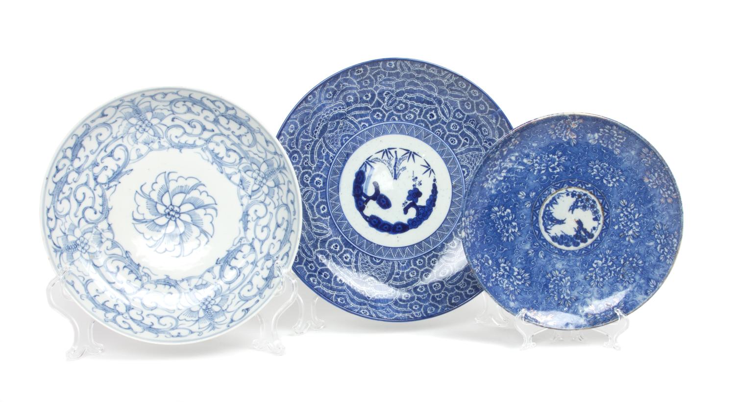 Two Japanese Blue and White Porcelain Plates Diameter of largest 11 1/2 inches.