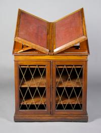 A George III Mahogany Library Cabinet, Height 33 x width 33 3/4 x depth 25 1/2 inches closed.