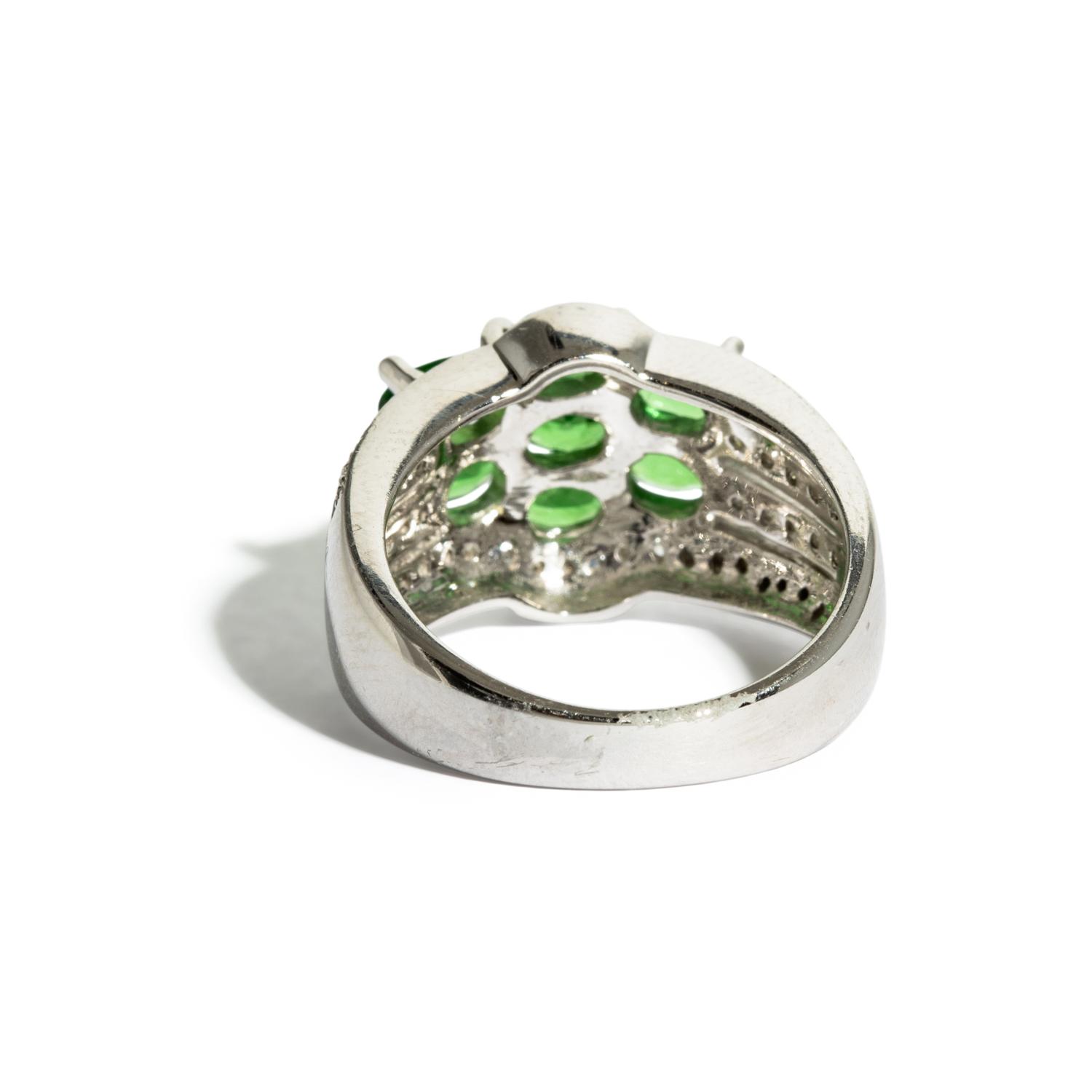COLLECTION OF WHITE GOLD AND MULTIGEM JEWELRY