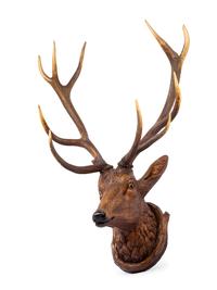 A Black Forest Carved Stag Head