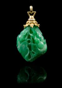 A Jadeite, 18 Karat Gold and Diamond Pendant Height 2 3/4 inches.