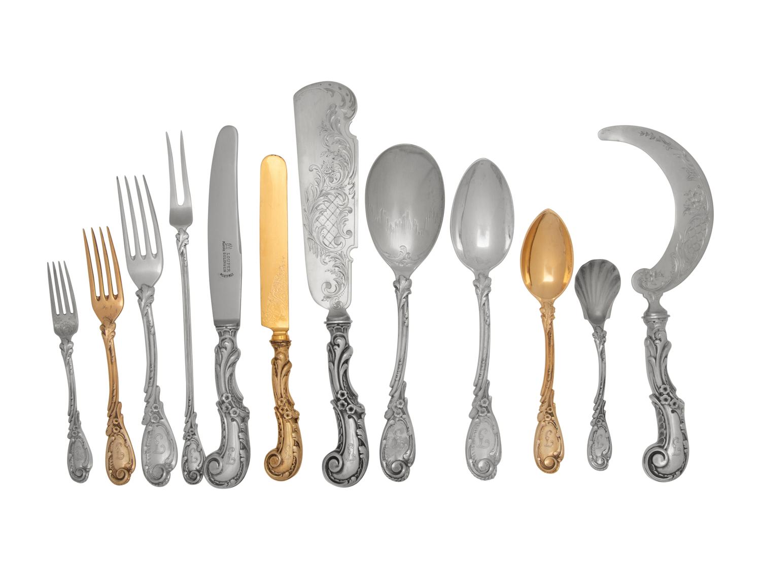 A Continental Silver-Gilt Flatware Service