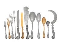 A Continental Silver-Gilt Flatware Service