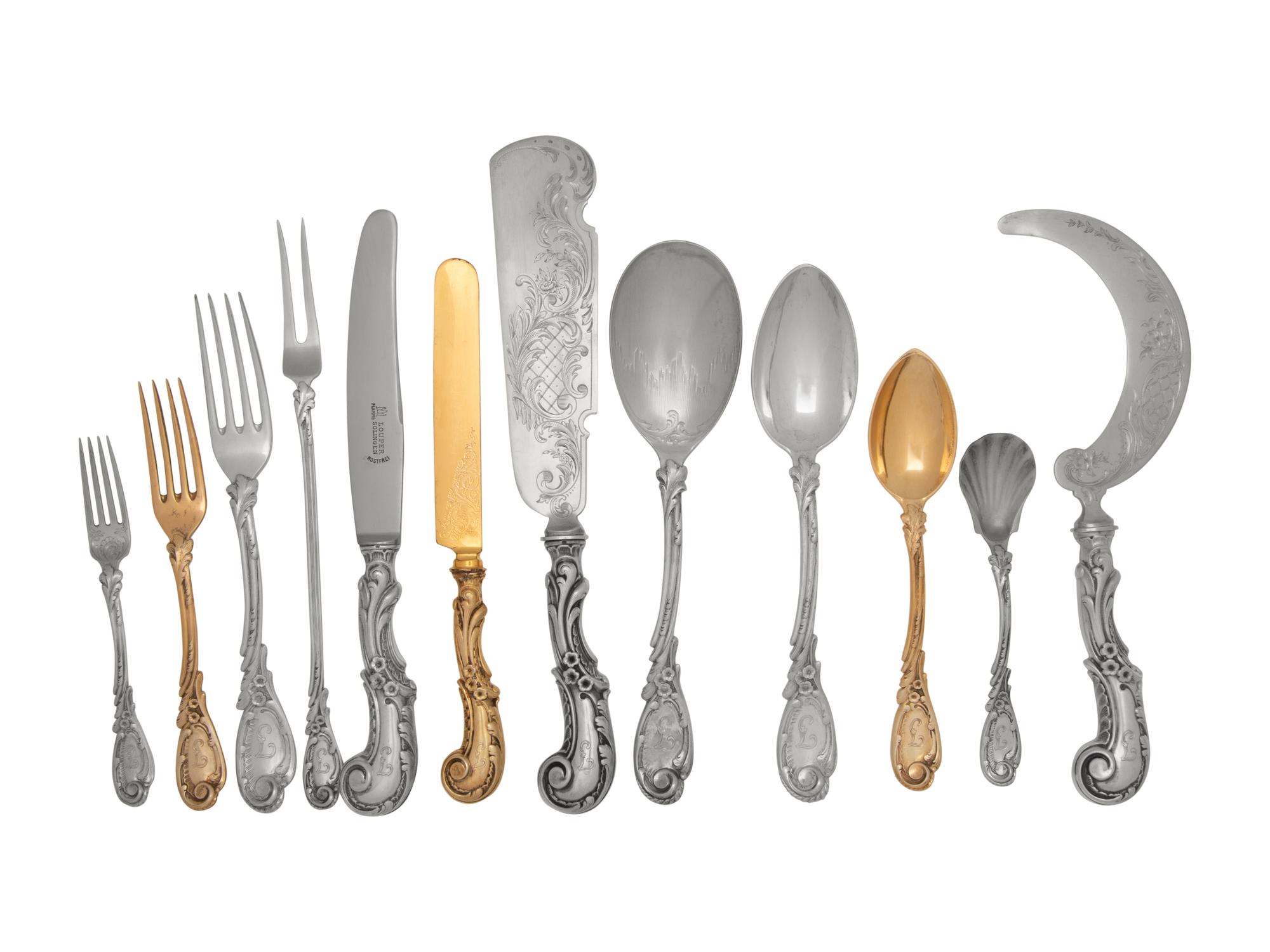 A Continental Silver-Gilt Flatware Service