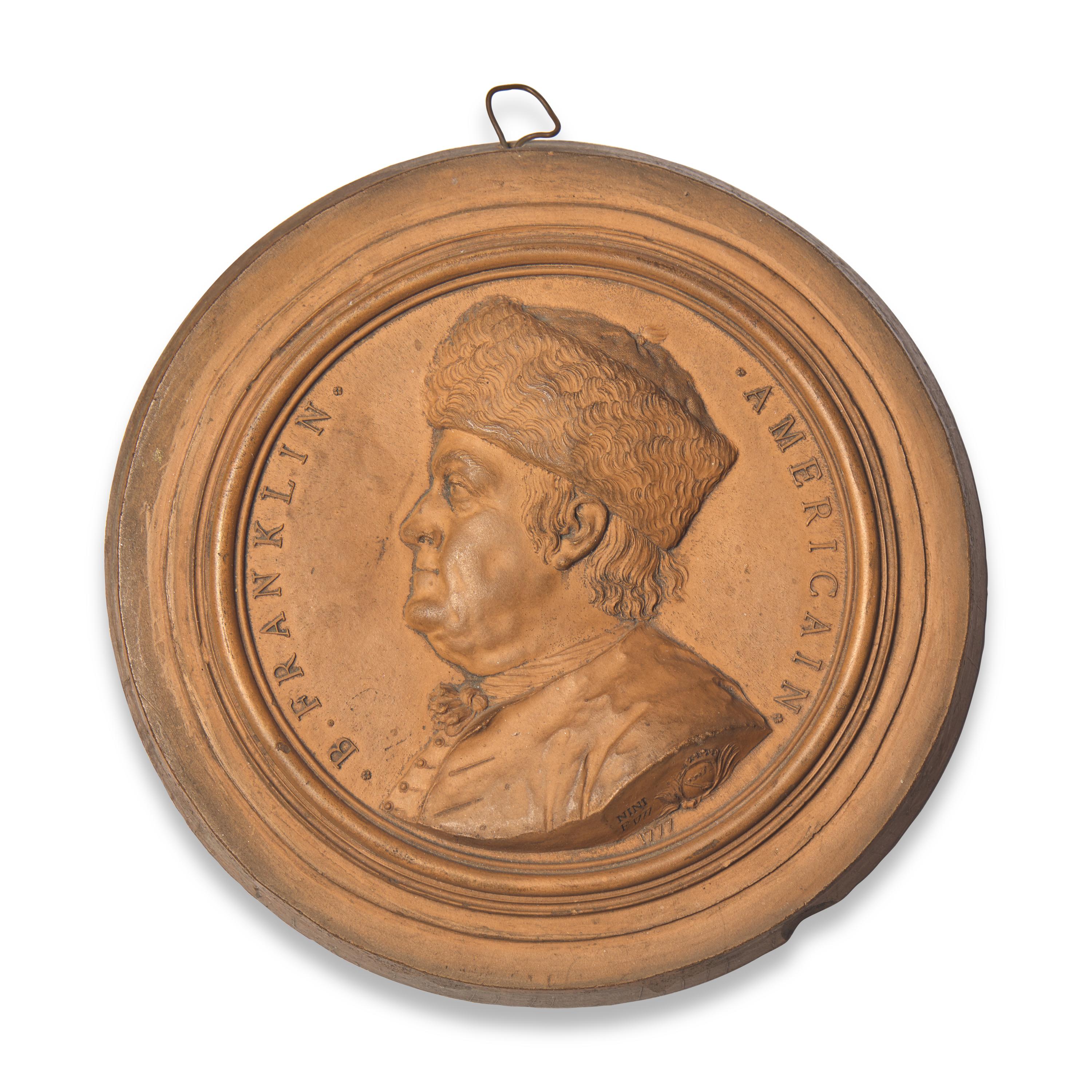 Jean-Baptiste Nini, (Italian, 1717-1786), A Terracotta Medallion of Benjamin Franklin in a Fur Cap