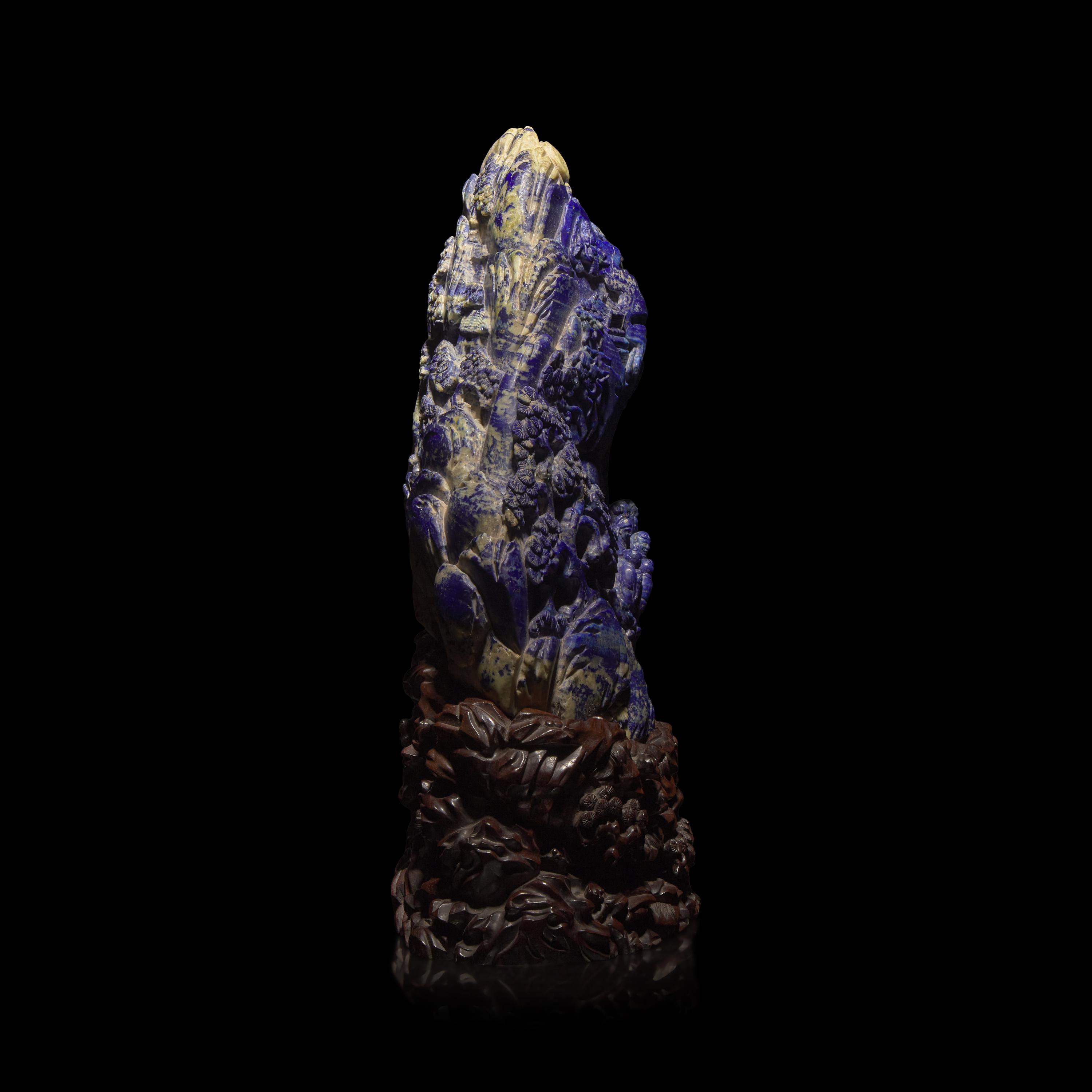 A Large Chinese Lapis Lazuli 'Eight Immortals Crossing the River' Boulder, Qing Dynasty — 清 青金石雕羅漢渡江山子