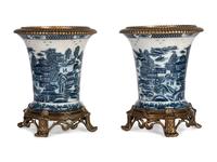 A Pair of United Wilson Gilt Metal Mounted Canton Style Porcelain Urns