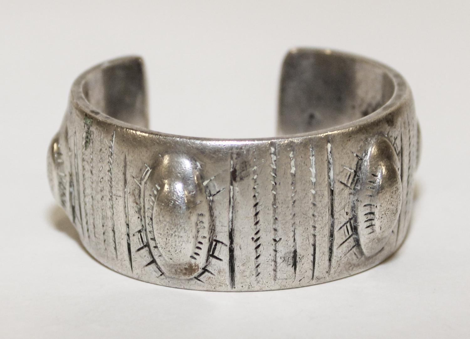 An Egyptian Silver Bangle Diameter of exterior 2 inches.