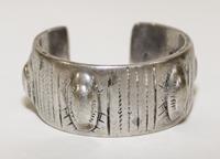 An Egyptian Silver Bangle Diameter of exterior 2 inches.