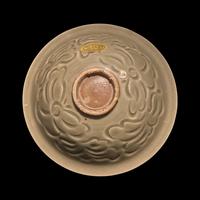 A Chinese Yaozhou Celadon 'Fish' Bowl, Northern Song Dynasty 北宋 耀州窯刻划花魚紋碗