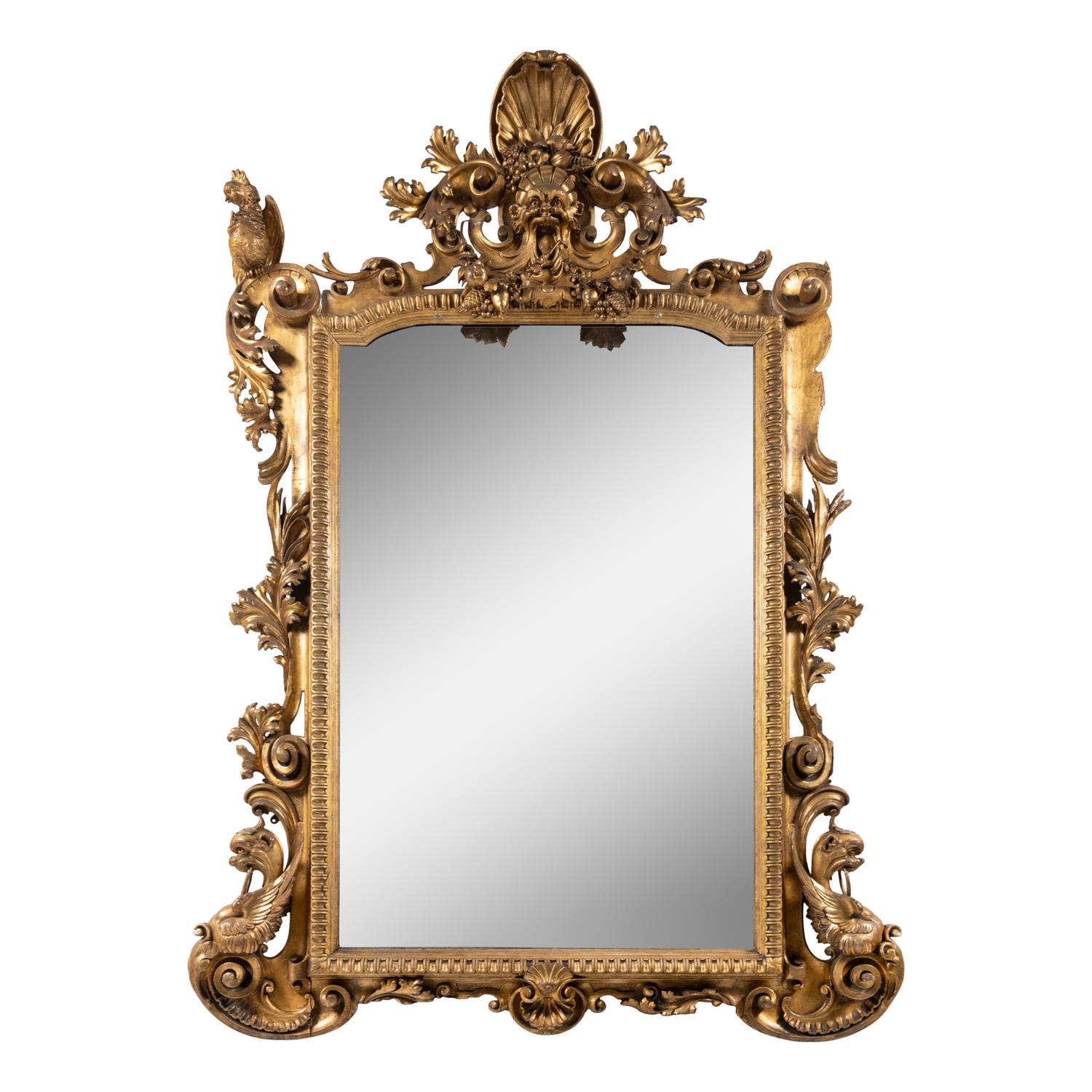 An Italian Baroque Style Giltwood Mirror
