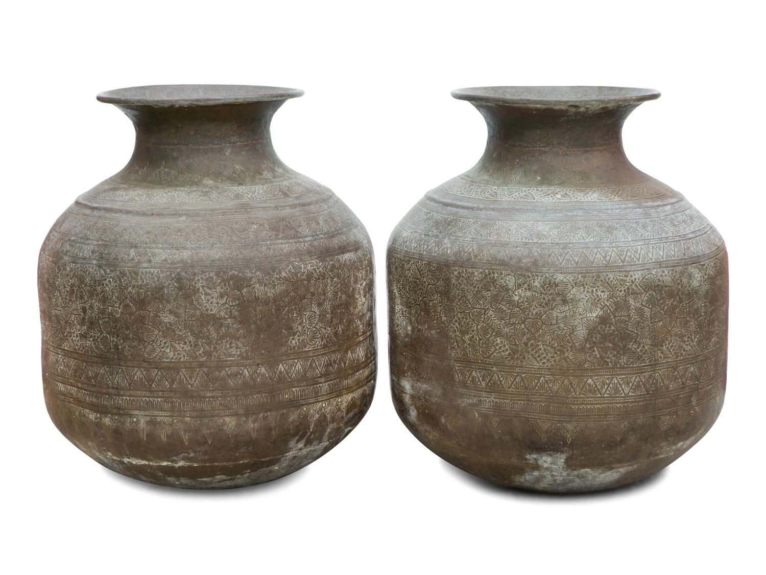 A Pair of Large Thai Hammered Metal Unrs — 20TH CENTURY