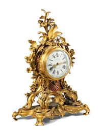 A Louis XV Gilt Bronze Mantel Clock