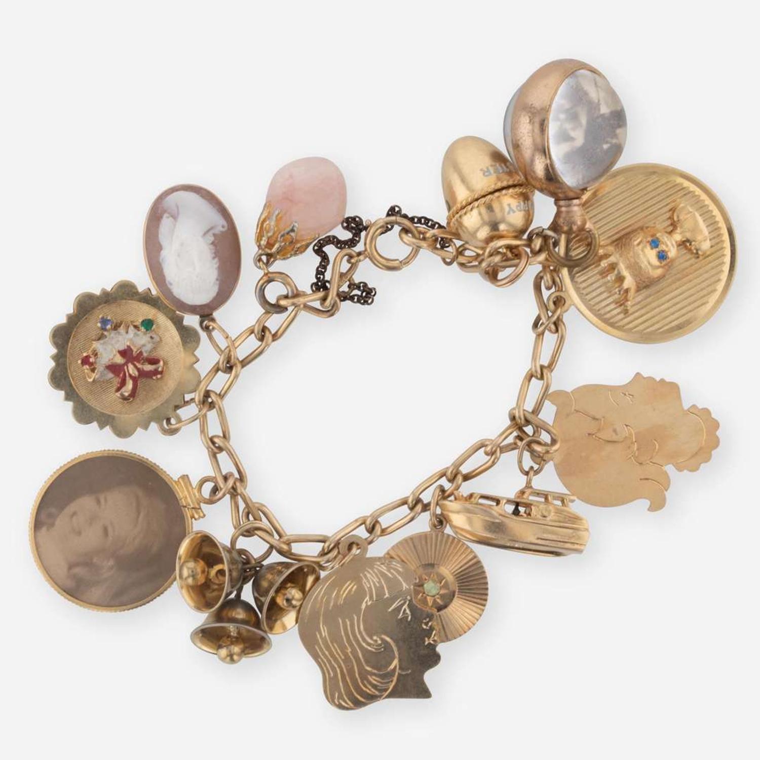 A Yellow Gold and Gemstone Charm Bracelet