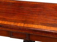 A Regency Crossbanded Mahogany Flip-Top Table