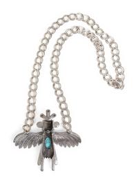 A Silver and Turquoise Pendant