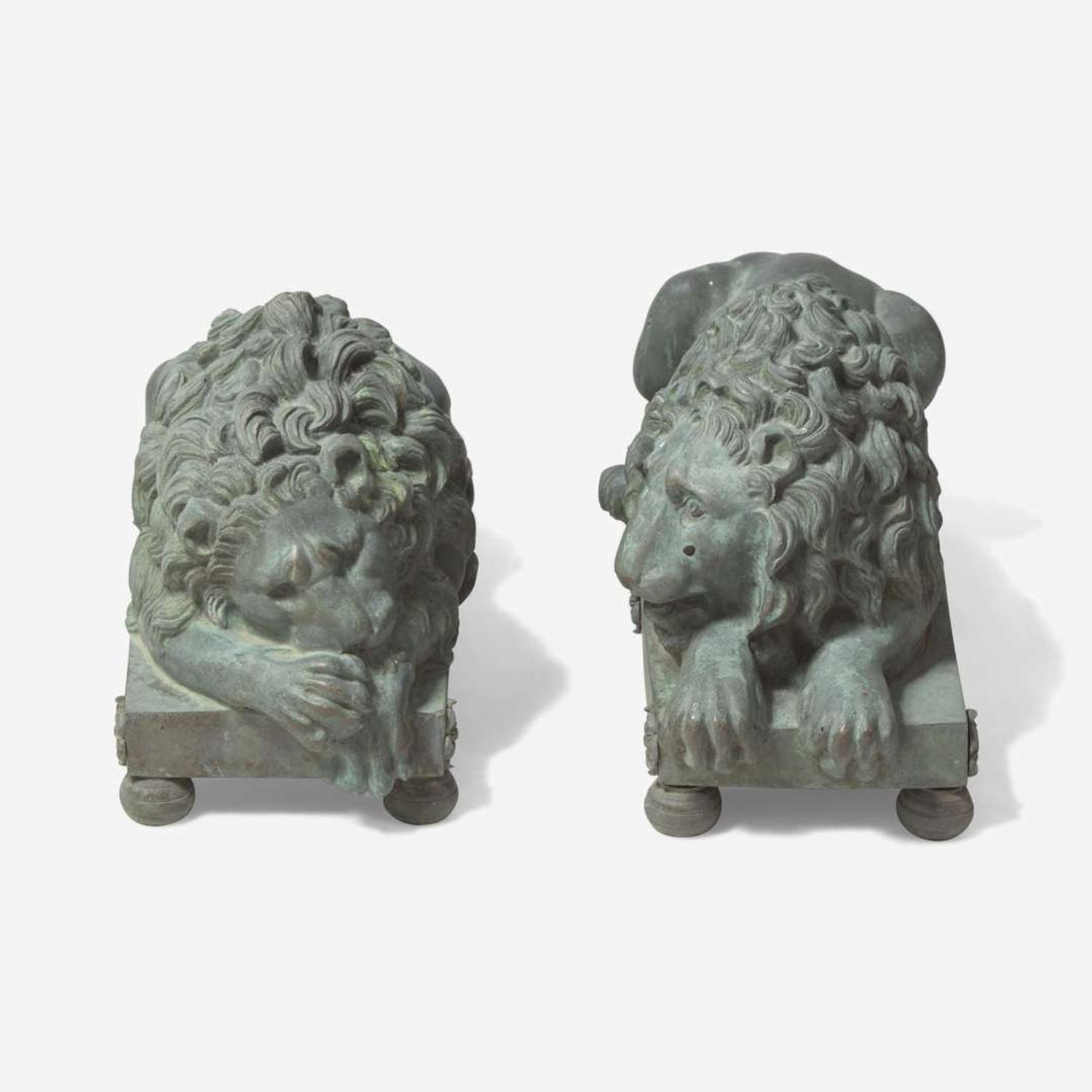 After Antonio Canova (Italian, 1757-1822) A Pair of Bronze Recumbent Lion Garden Sculptures, late 19th / 20th century