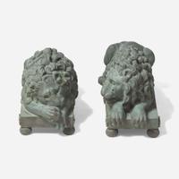 After Antonio Canova (Italian, 1757-1822) A Pair of Bronze Recumbent Lion Garden Sculptures, late 19th / 20th century