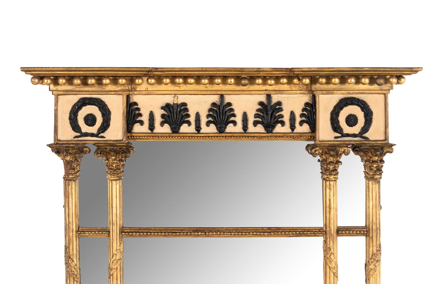 A Regency Giltwood and Part Ebonized Mirror