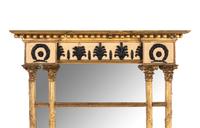 A Regency Giltwood and Part Ebonized Mirror