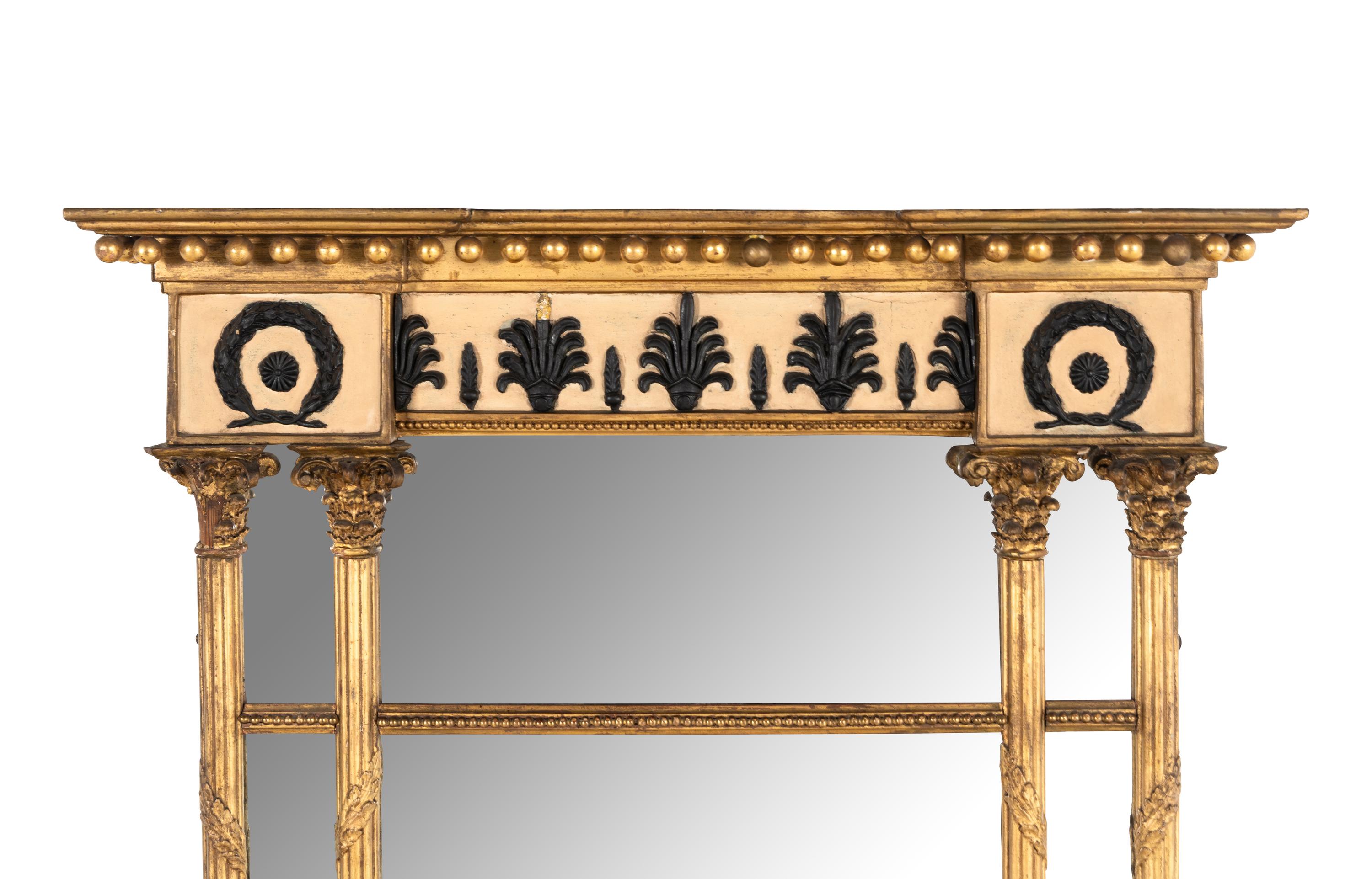 A Regency Giltwood and Part Ebonized Mirror