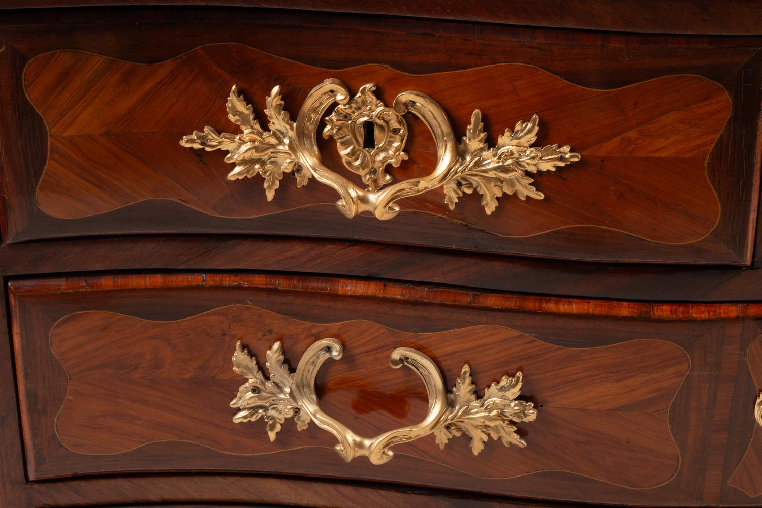 A Régence Gilt Bronze Mounted Kingwood and Tulipwood Parquetry Marble-Top Commode