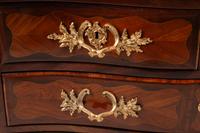 A Régence Gilt Bronze Mounted Kingwood and Tulipwood Parquetry Marble-Top Commode