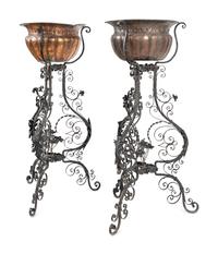 A Pair of Copper Jardinières on Black-Painted Wrought Metal Stands