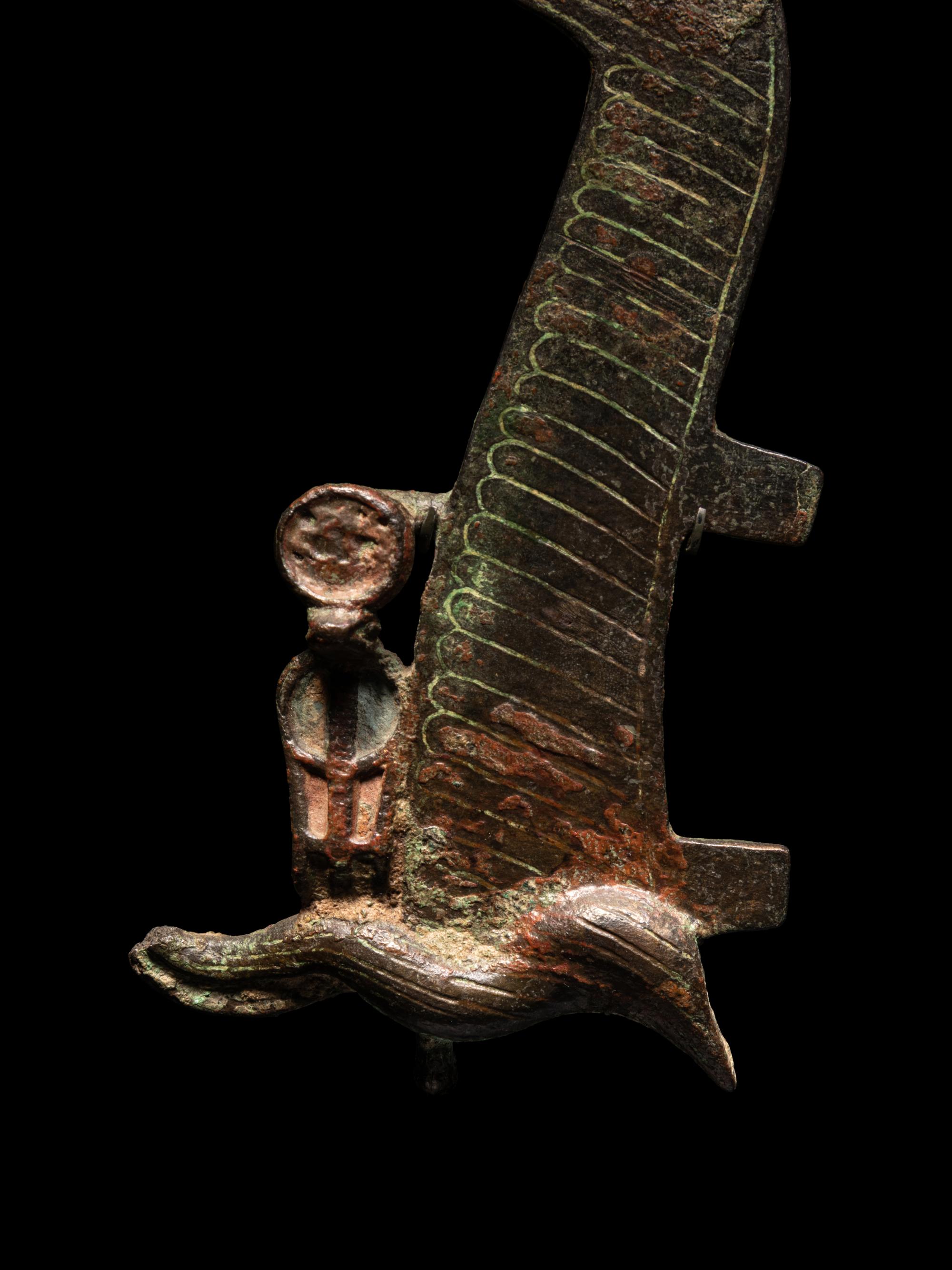 A Pair of Egyptian Bronze Ostrich Plumes