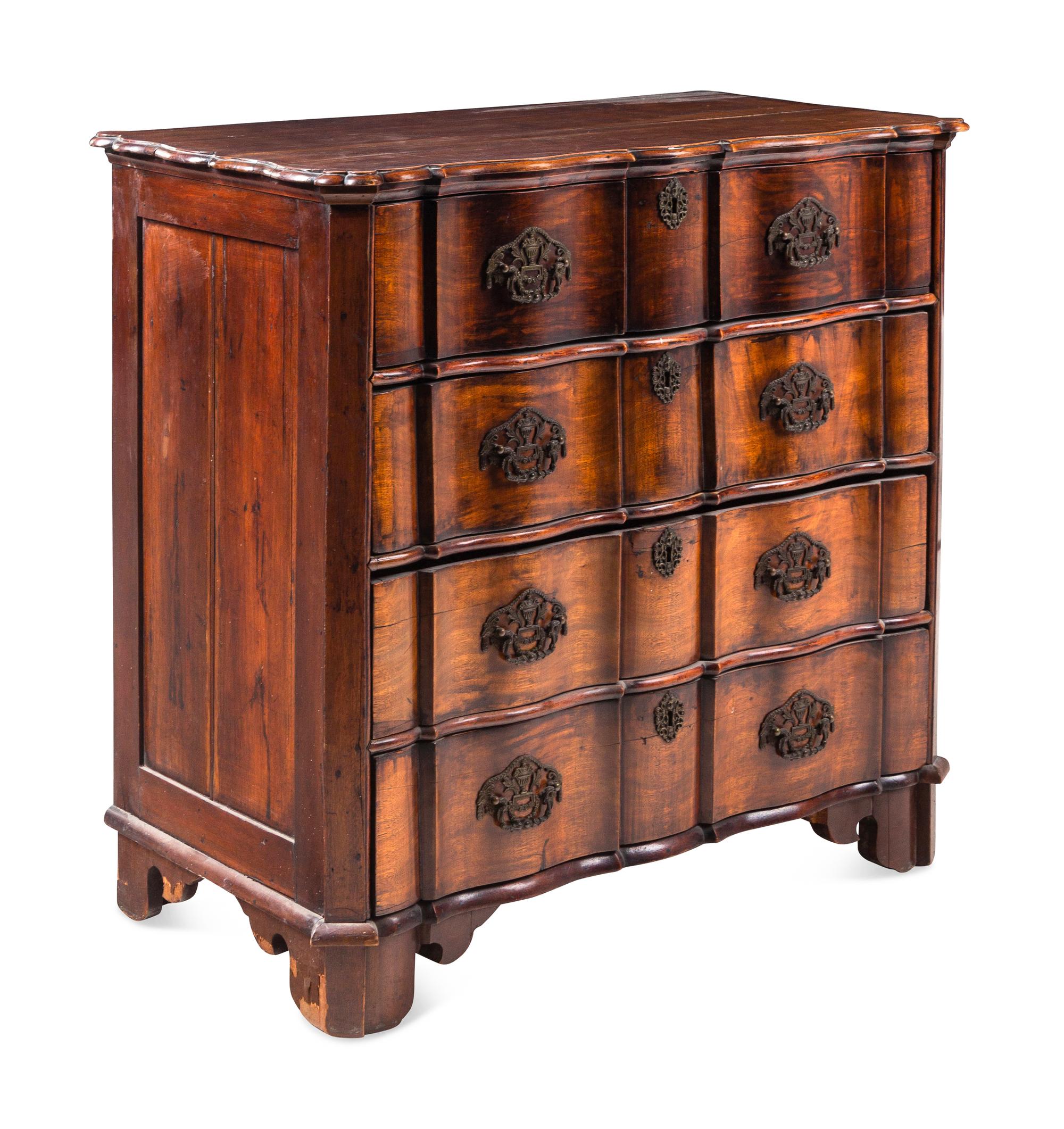 A Dutch Walnut Serpentine-Front Chest of Drawers