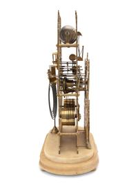 A Victorian Brass Cathedral-Form Skeleton Clock
