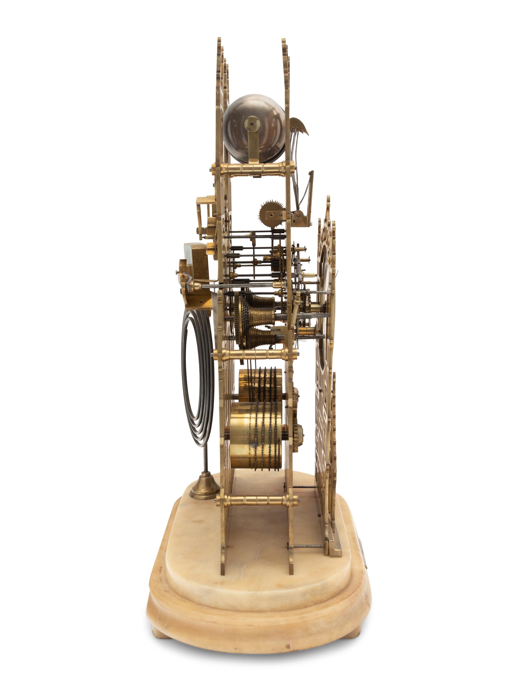 A Victorian Brass Cathedral-Form Skeleton Clock