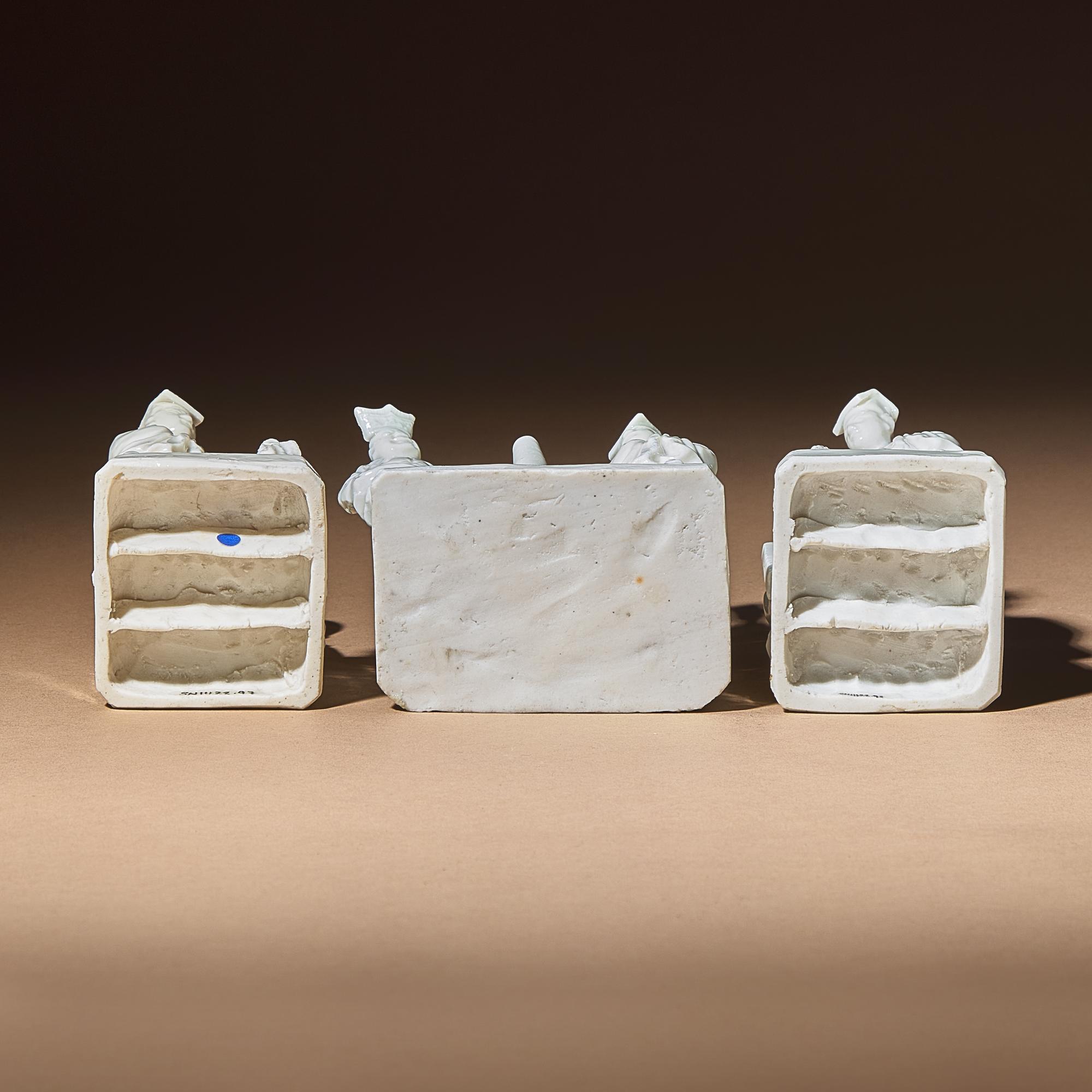 Three Chinese Blanc-de-Chine Porcelain Figural Group-Form Joss-Stick Holders, 17th Century — 清早期 德化白瓷塑人像香插三件