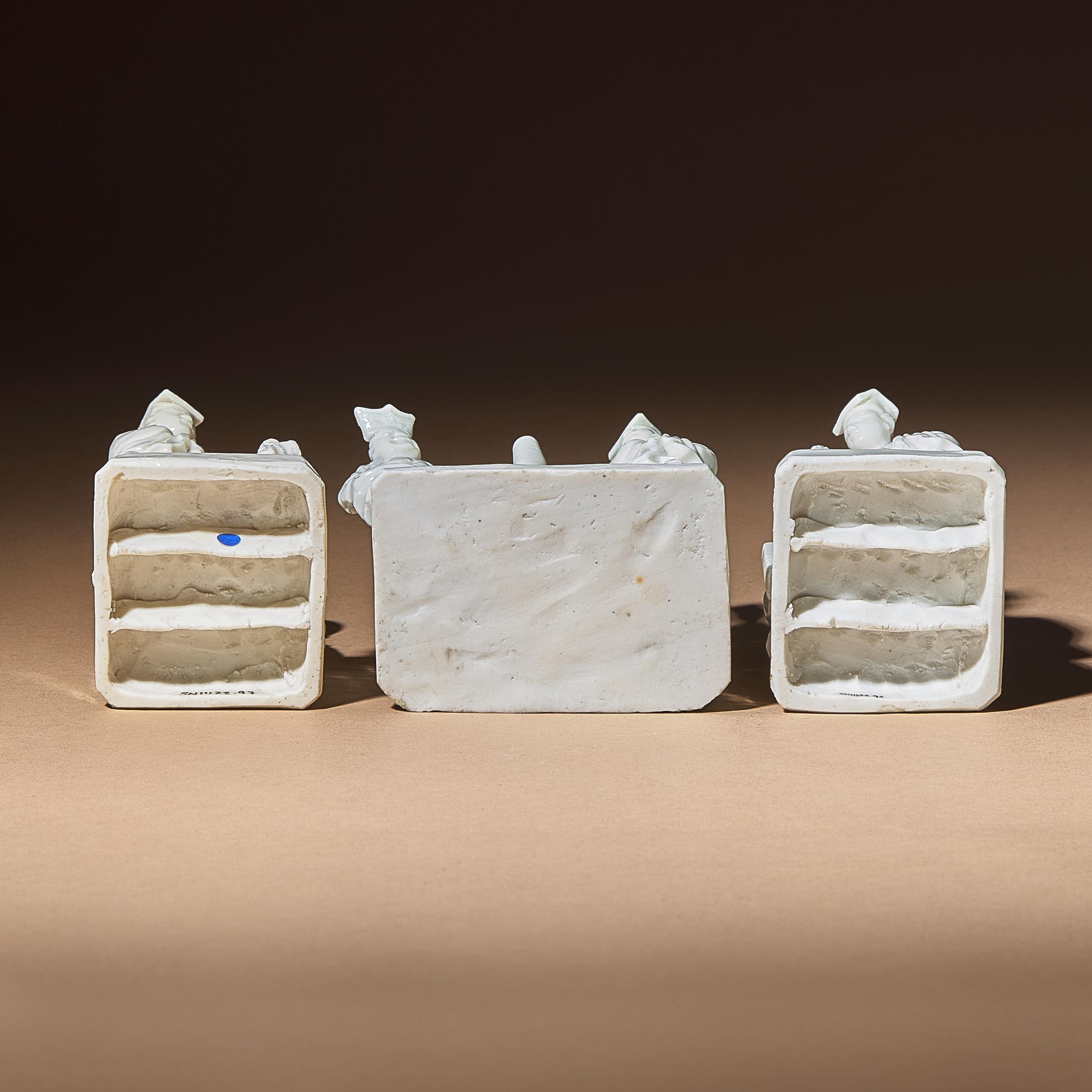 Three Chinese Blanc-de-Chine Porcelain Figural Group-Form Joss-Stick Holders, 17th Century — 清早期 德化白瓷塑人像香插三件