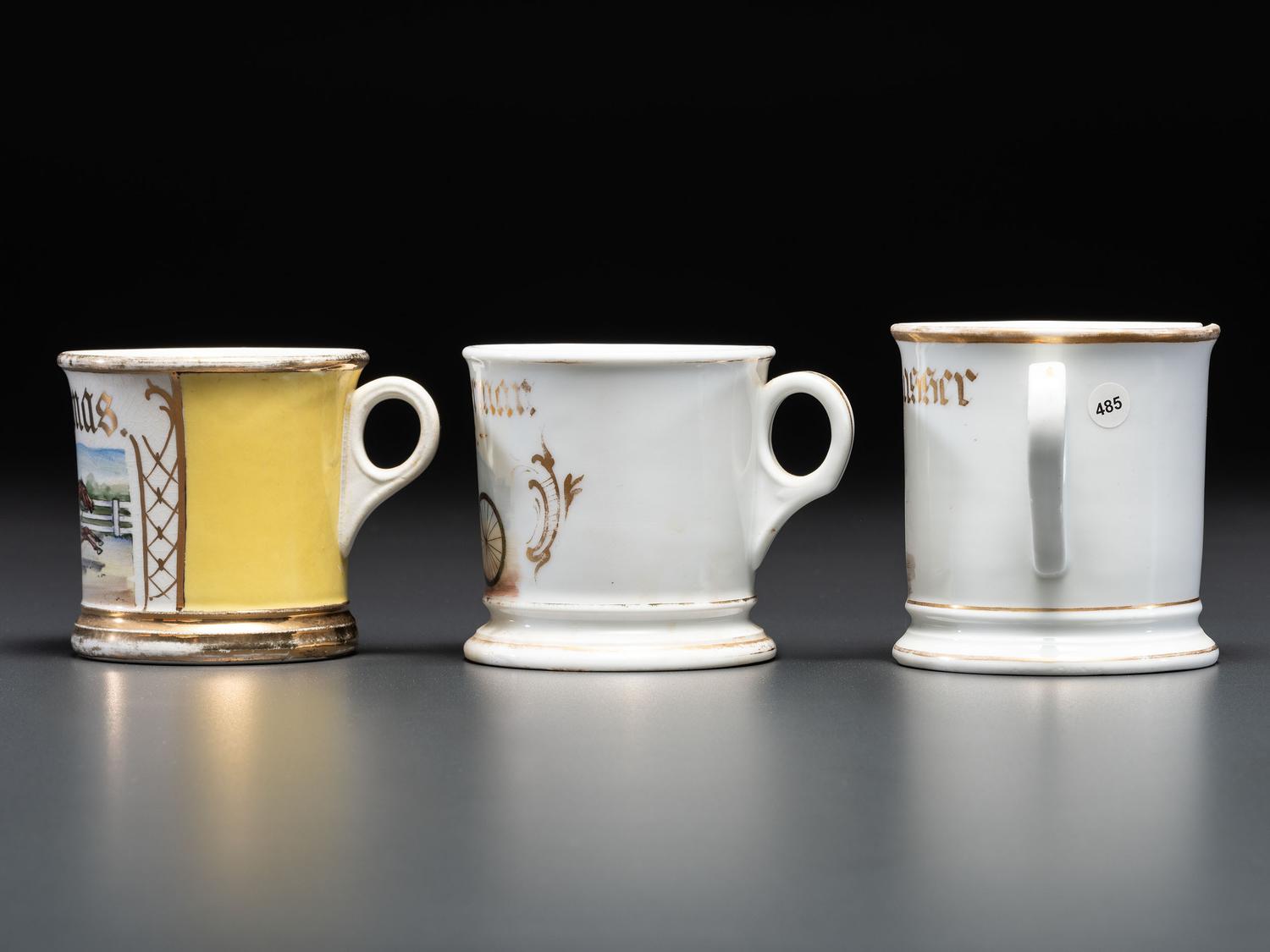 Three Sporting Porcelain Shaving Mugs