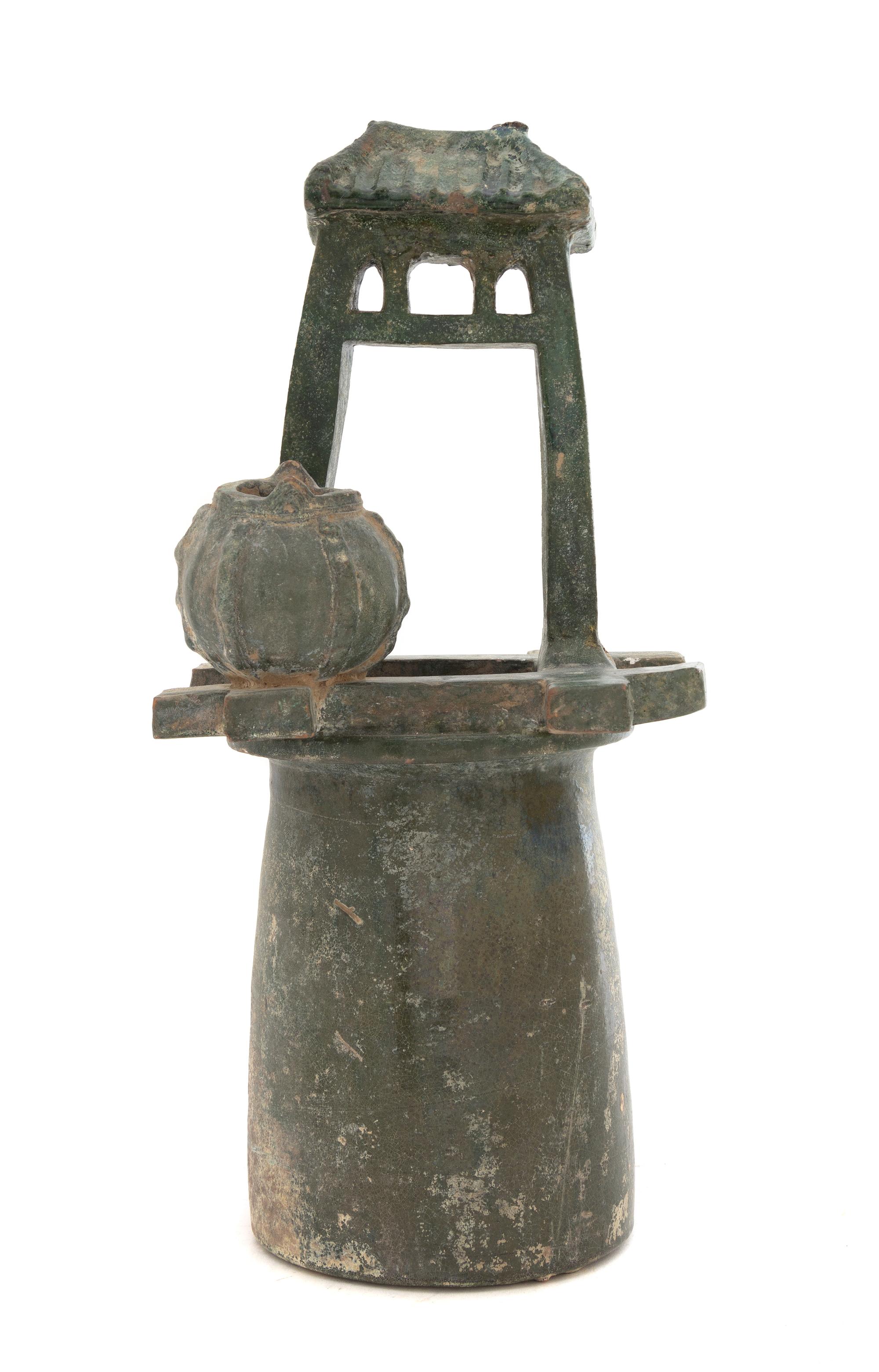 A Chinese Green Glazed Pottery Model of a Well Height 14 1/2 inches. — HAN DYNASTY (206 B.C. - A.D. 220)