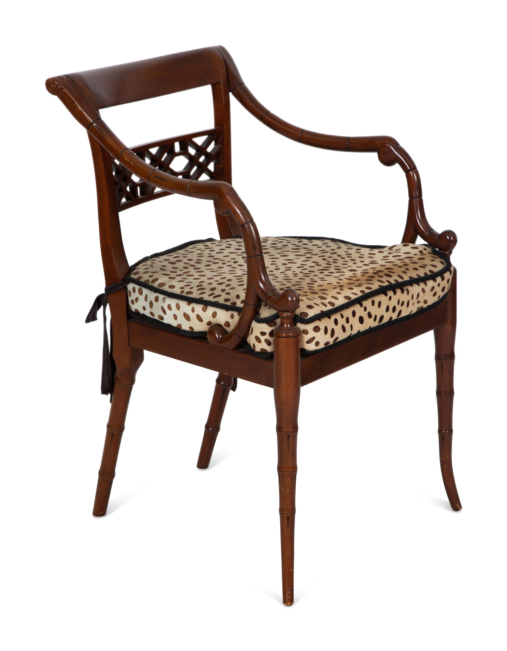 A Set of Four Regency Style Mahogany Cane Seat Dining Chairs